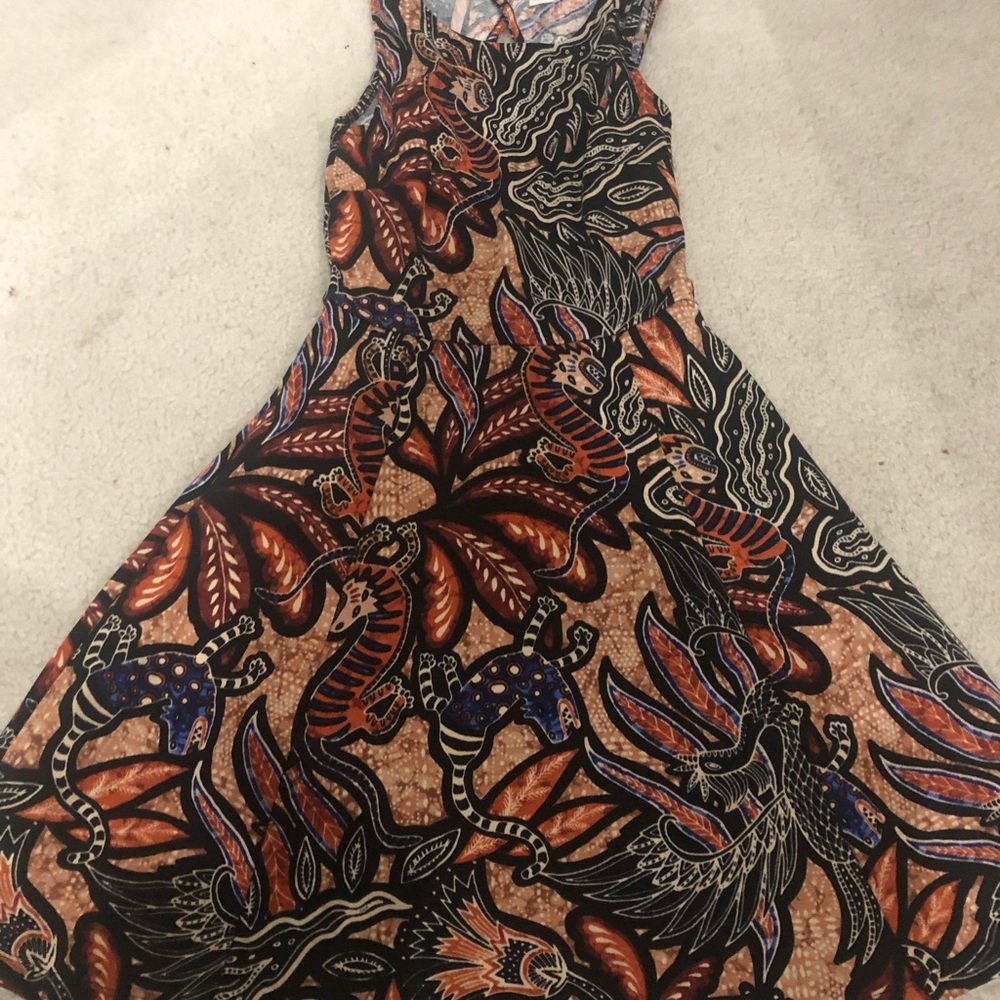 H&M very unique dress! Good fit and comfortable!